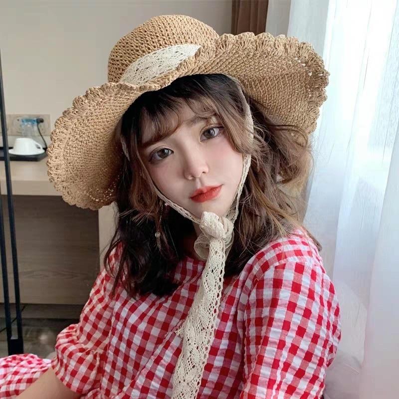 Ai thường đội mũ đi biển?